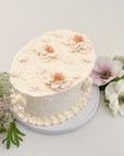 HER GARDEN CAKE WITH FLORAL PIPING